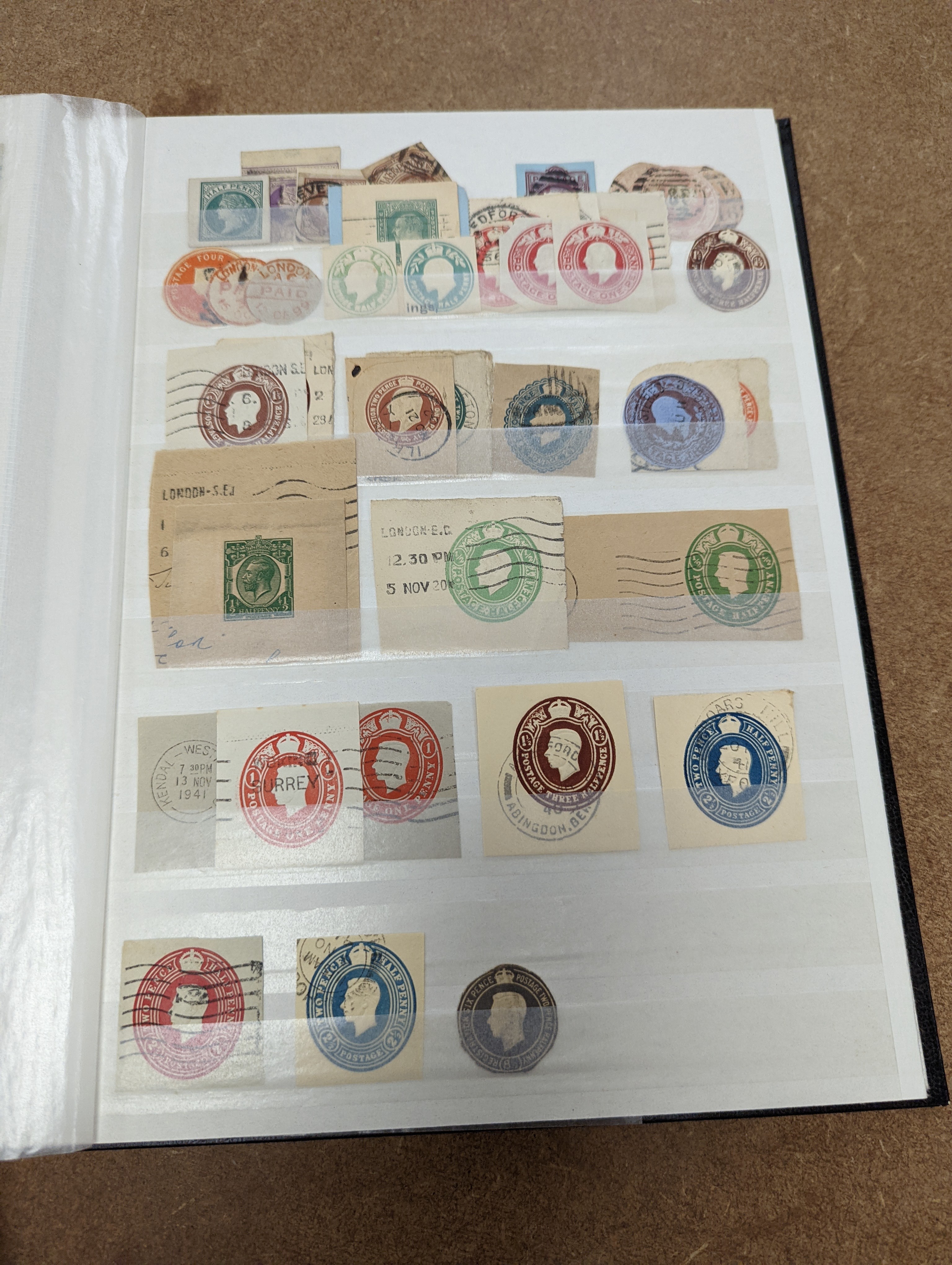 Great Britain stamps in stock book with 1840 1d black and 1841 2d blue unused. 1841 1d red brown mint block of 8, 1864-79 1d red plates in mint blocks including plate 79 block of 48, plate 170 block of 6 with marginal in